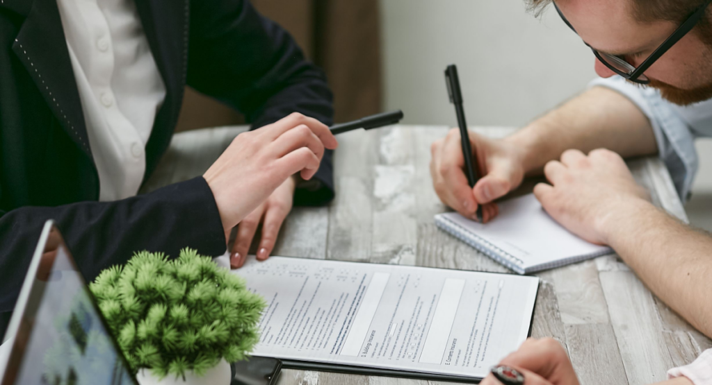 Insurance company working through a policy renewal with a customer